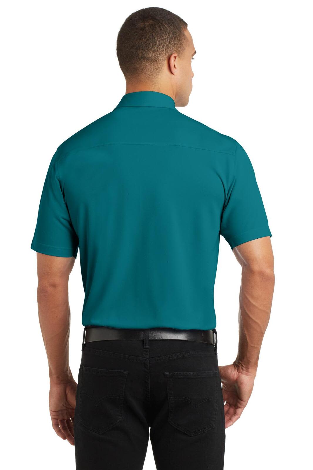 A teal polo shirt worn by a person, viewed from the back, with short sleeves and a collar. The shirt has a logo.