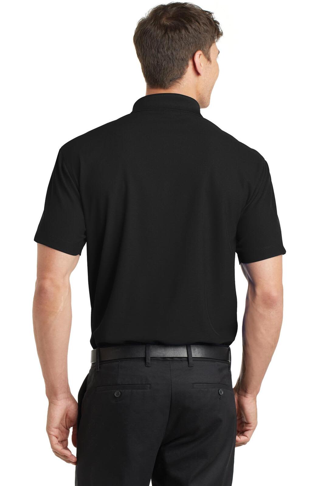 A black polo shirt displayed from the back, featuring short sleeves and a sleek design. It has a logo on the chest.
