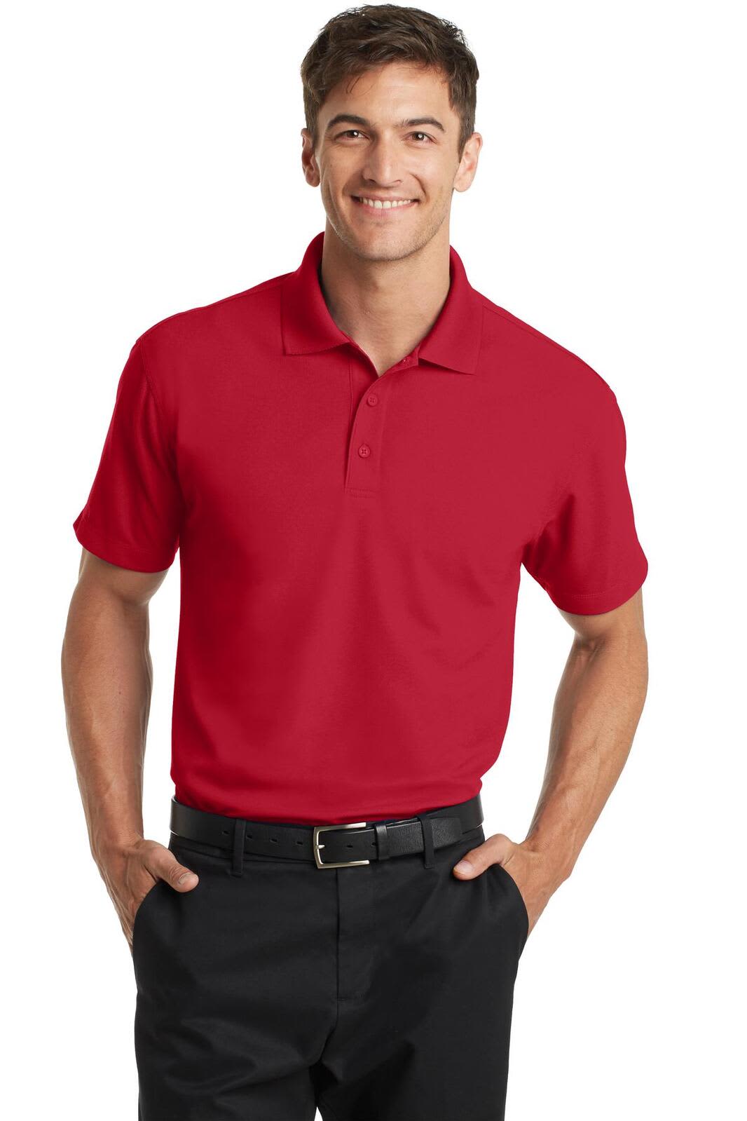 A red polo shirt on a smiling model, featuring a one-button collar and short sleeves, with a logo.