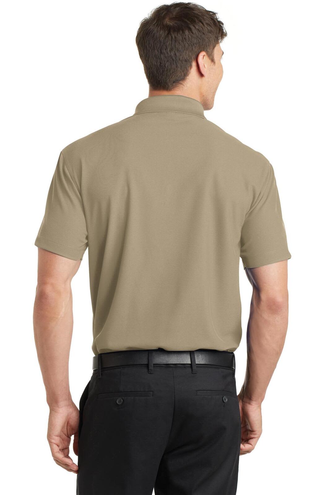 A back view of a khaki Port Authority Dry Zone Grid Polo shirt, featuring a collar and short sleeves.