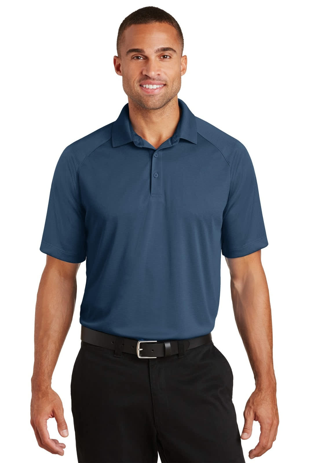 A short-sleeved navy polo shirt with a collar, featuring a logo on the chest. Model is wearing black trousers.