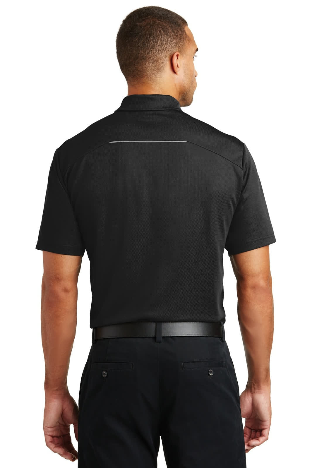 A black Port Authority Pinpoint Mesh Polo shirt, featuring a collar and short sleeves, with a back view showcasing a logo.