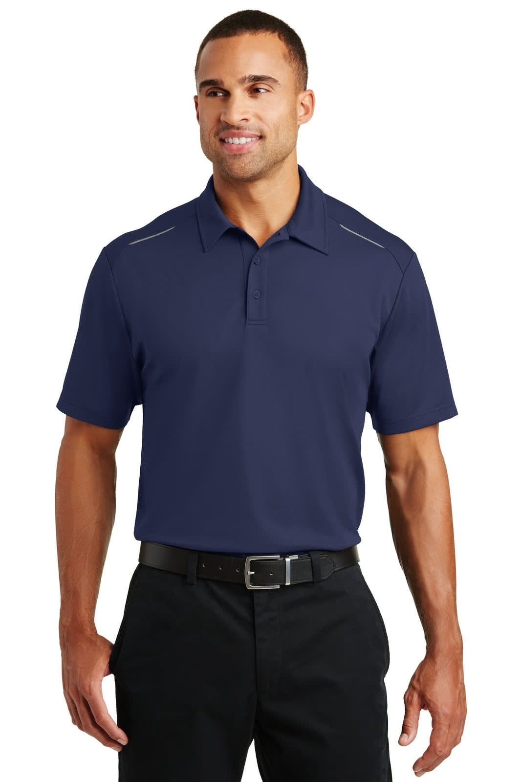 A navy blue Port Authority Pinpoint Mesh Polo shirt with a logo, featuring a classic collar and short sleeves.