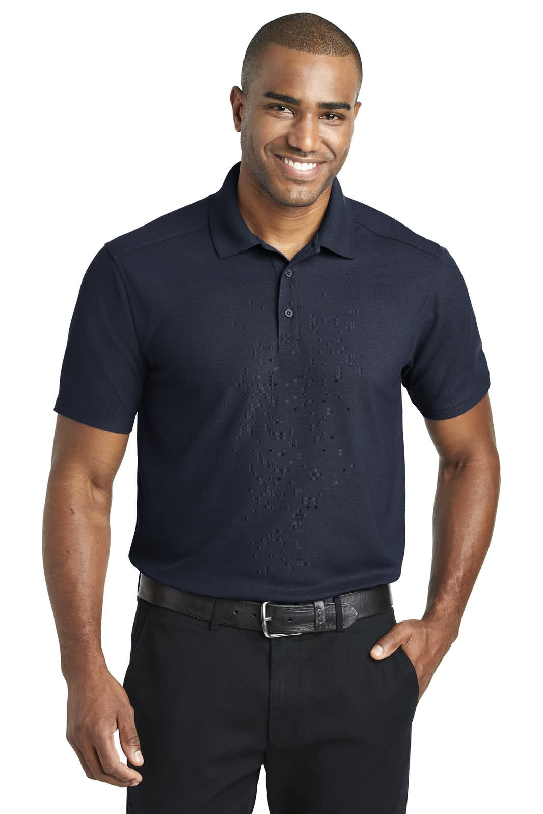 A navy blue polo shirt featuring short sleeves and a collar, worn by a smiling male model. It has a branding logo.