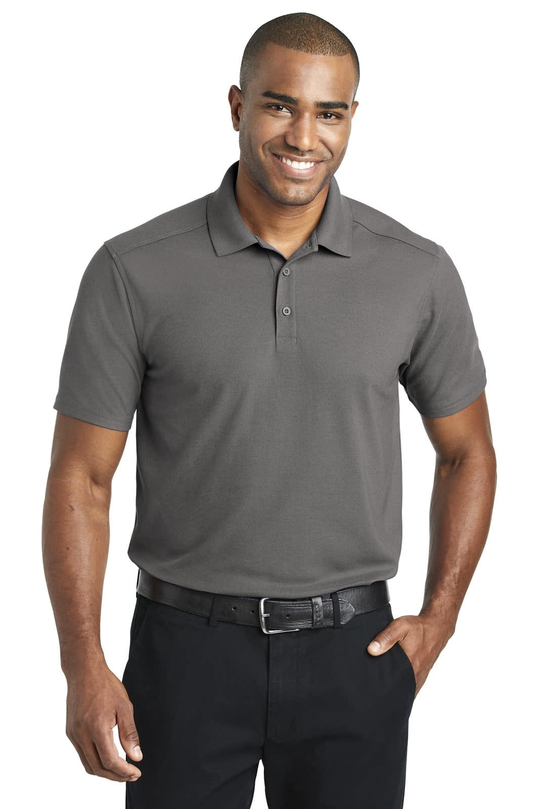 A man models a grey short-sleeve polo shirt with a collar and a logo. He is wearing black trousers.
