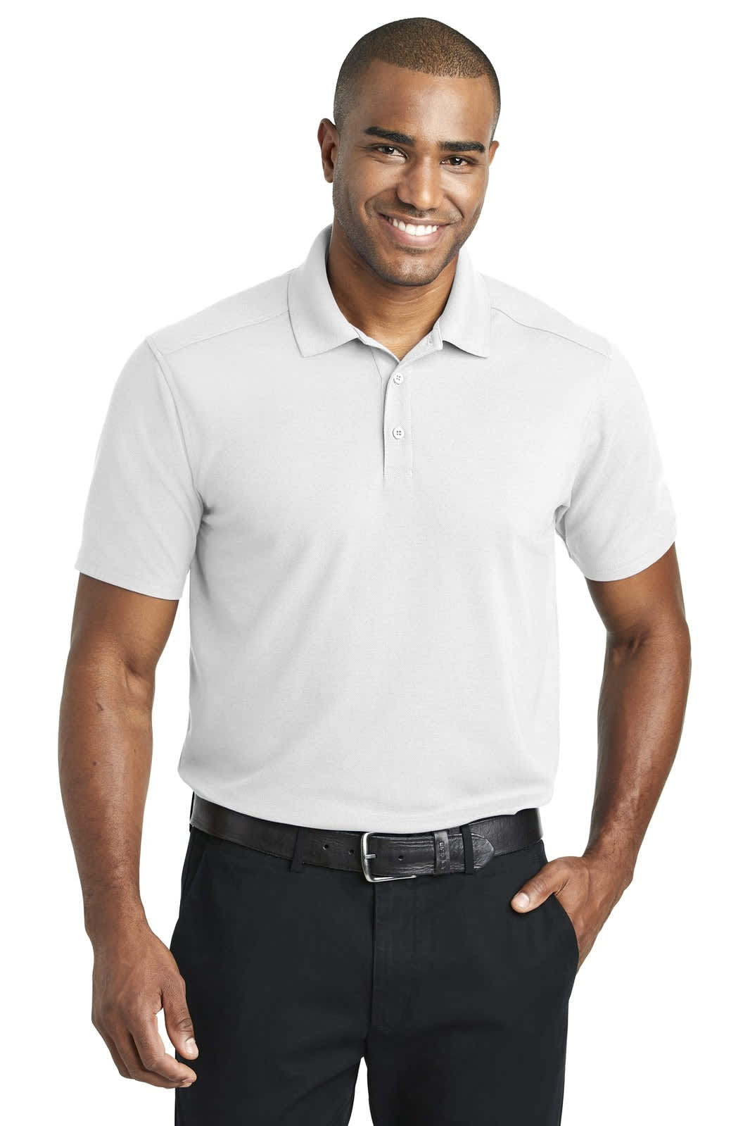 A man wearing a light grey polo shirt with a collar, paired with black trousers and a belt. The shirt features a logo.
