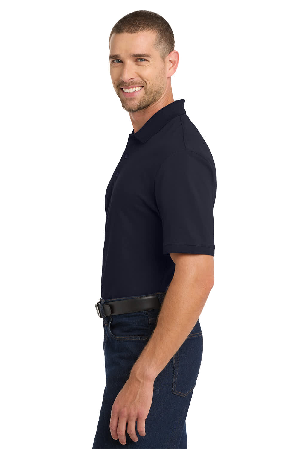 A navy blue polo shirt displayed on a smiling male model. The shirt features a collar and has a logo.