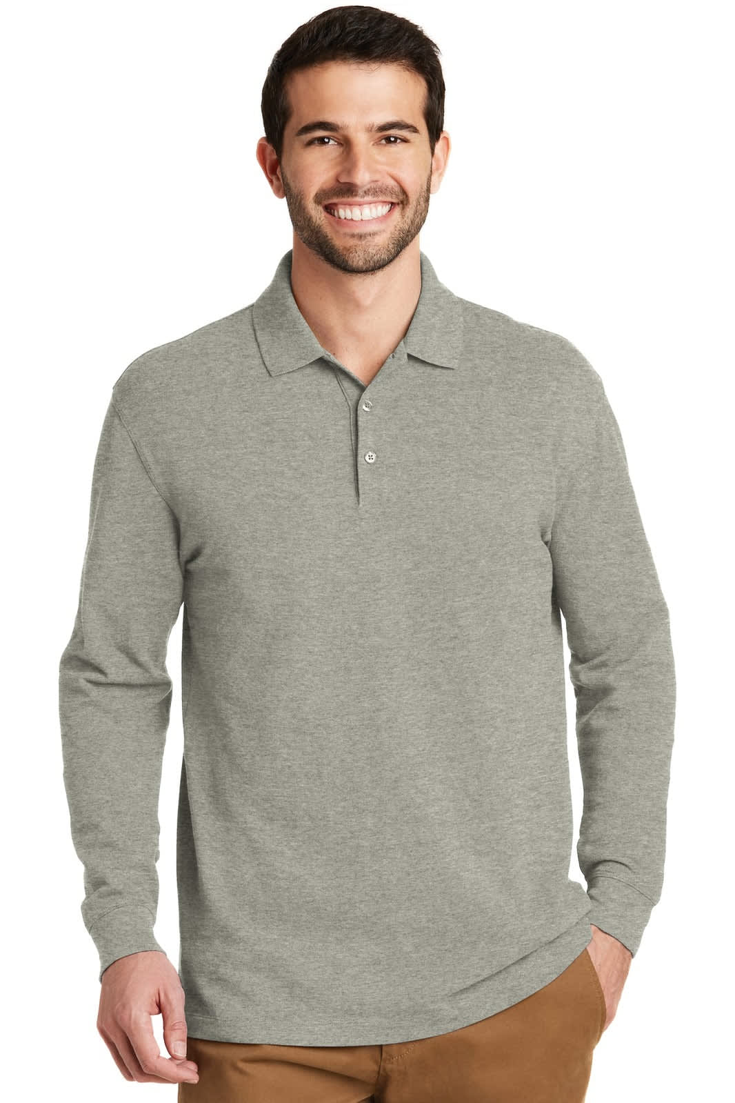 A long sleeve polo shirt in heather grey, featuring a collar and a logo on the chest. Model is smiling.