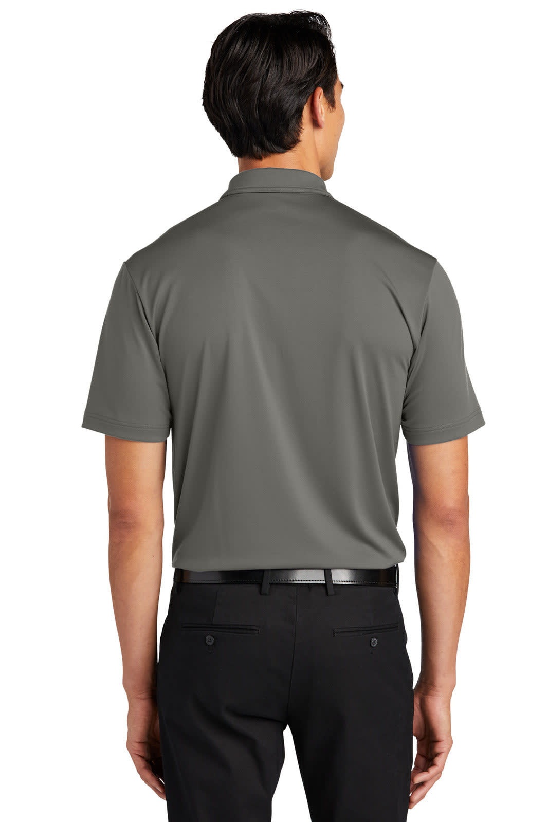 A man wearing a dark grey polo shirt from the back, paired with black pants. The shirt has a logo on the collar.