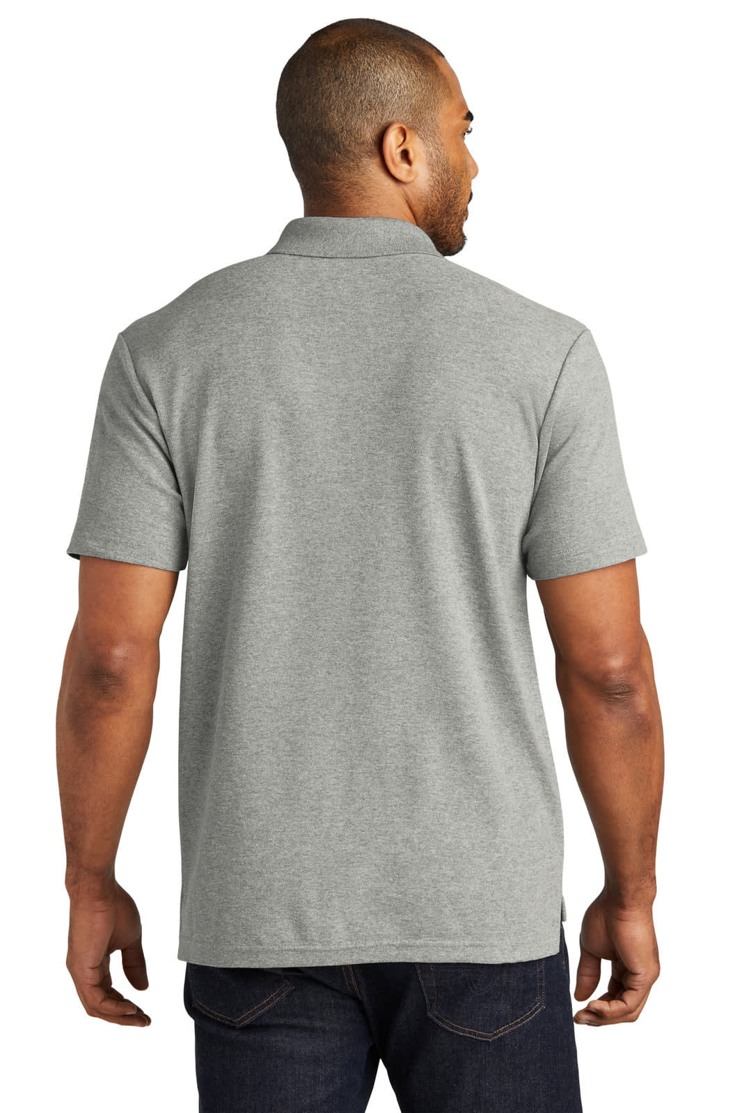 A man is wearing a grey polo shirt, viewed from the back. The shirt features a logo.