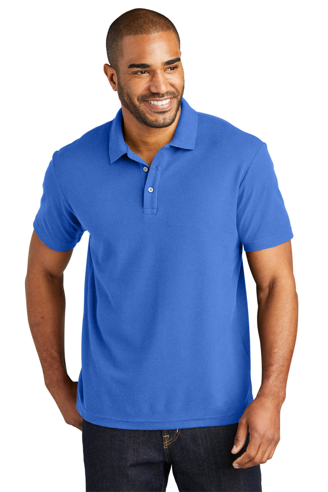 A blue polo shirt is worn by a smiling man. The shirt features a collar and has a logo on it.