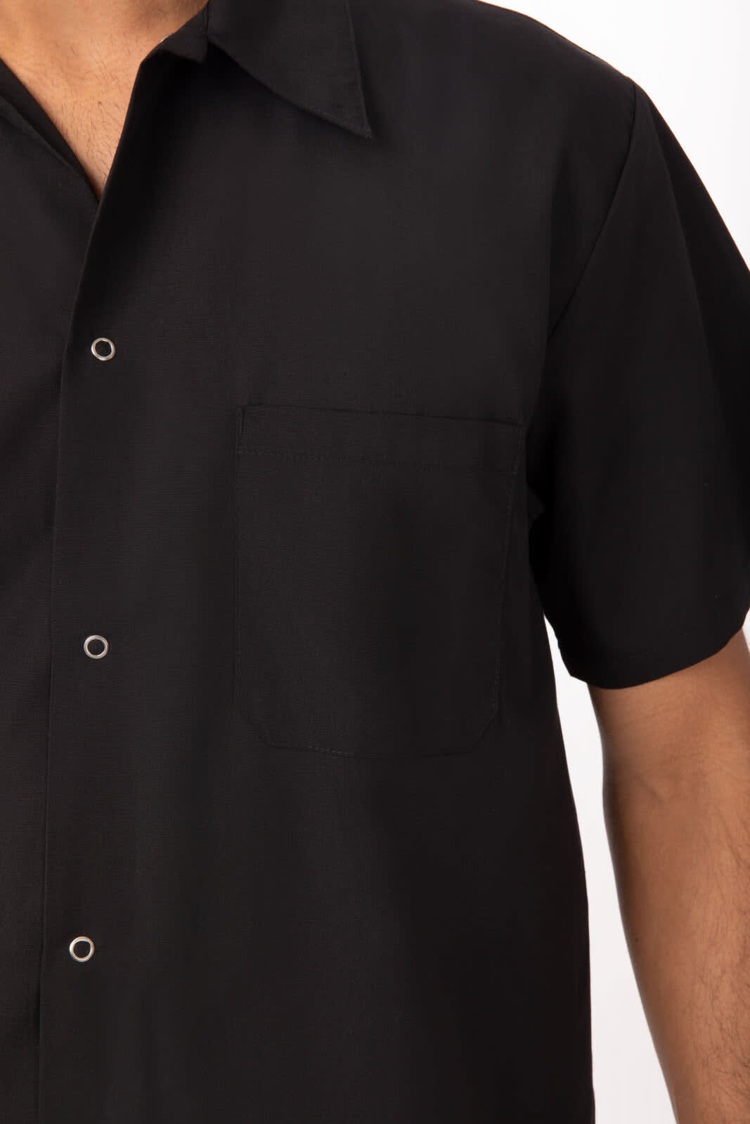 A black utility men's cook shirt featuring a pocket and short sleeves, with a logo on the fabric.