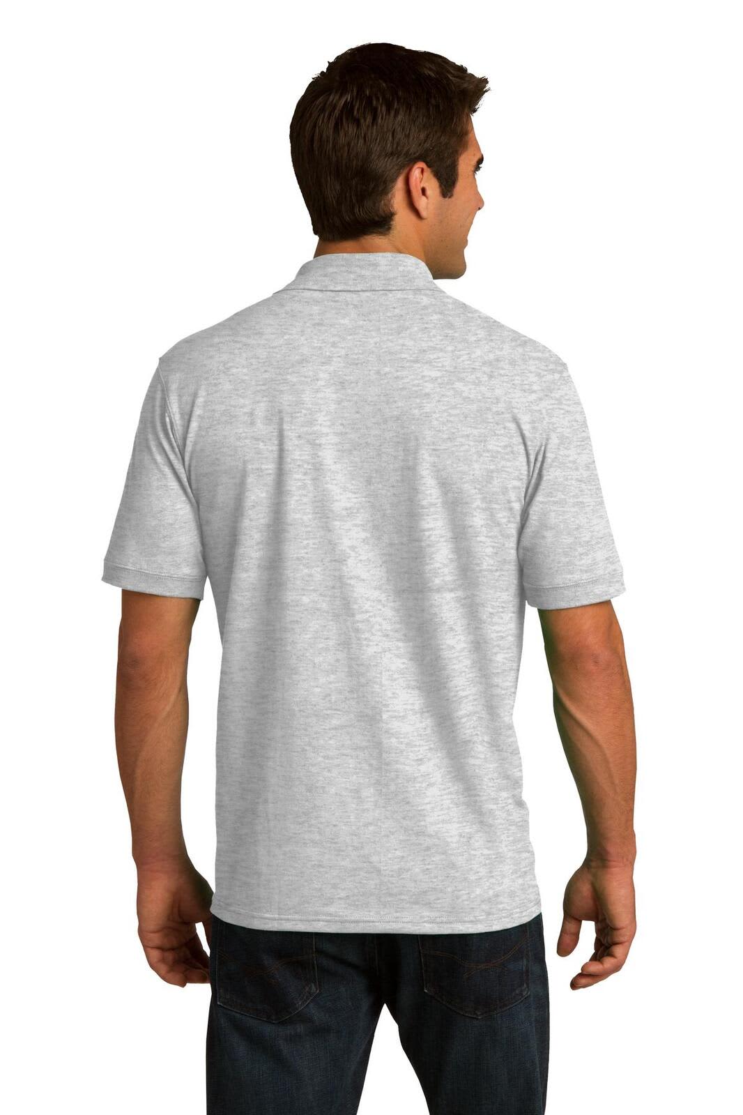 A man wearing a grey Port & Company Core Blend Jersey Knit Polo, viewed from the back, featuring a logo.
