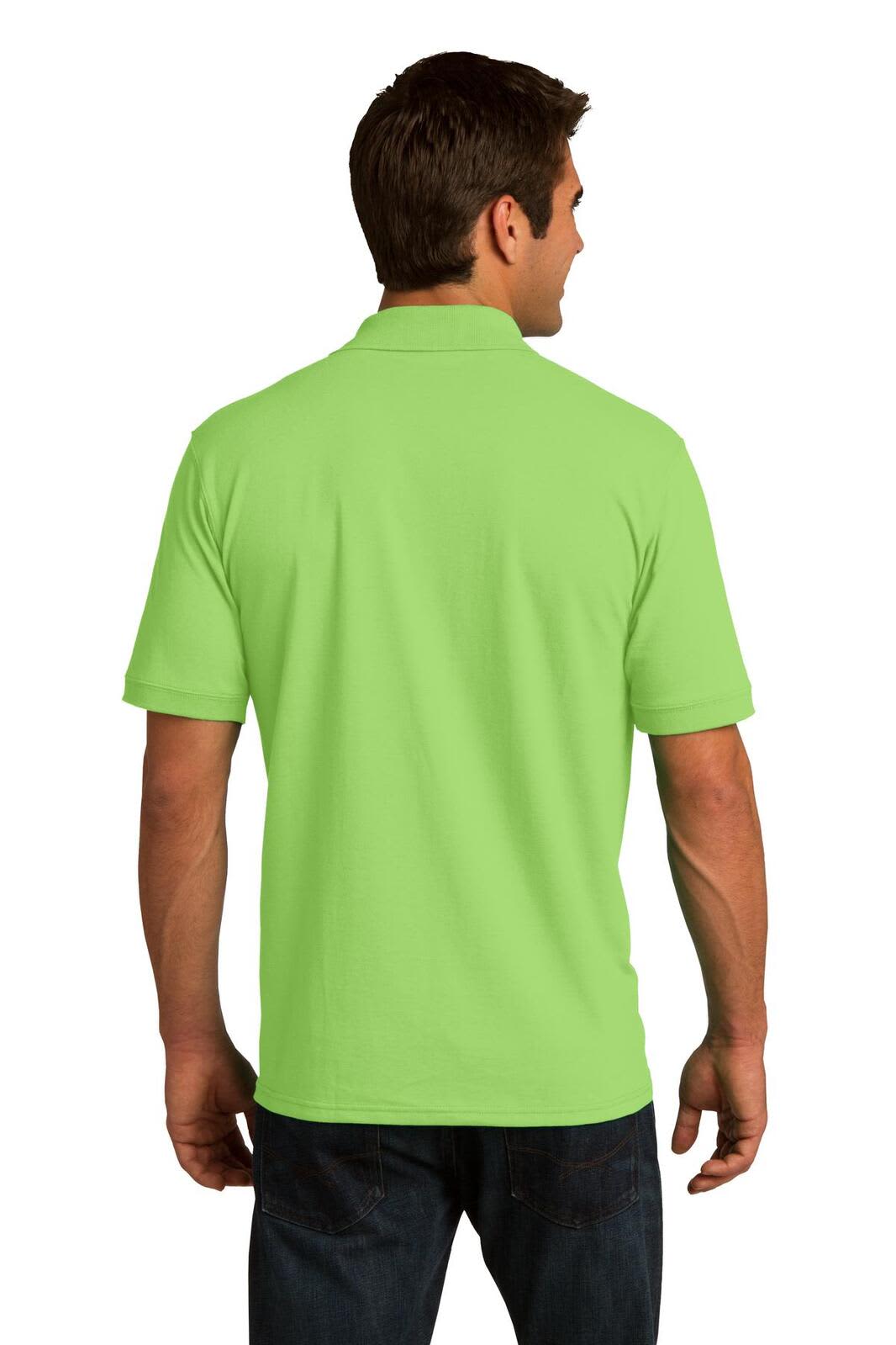 A green Port & Company Core Blend Jersey Knit Polo shirt, viewed from the back, featuring a logo.