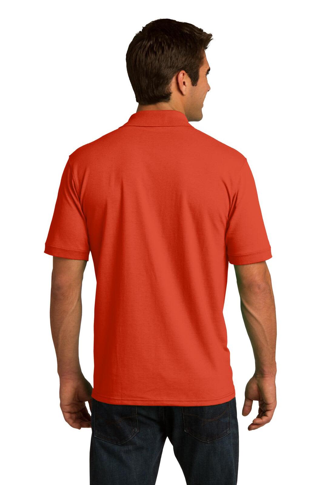 A man is wearing a short-sleeved, bright red polo shirt, featuring a logo on the back.