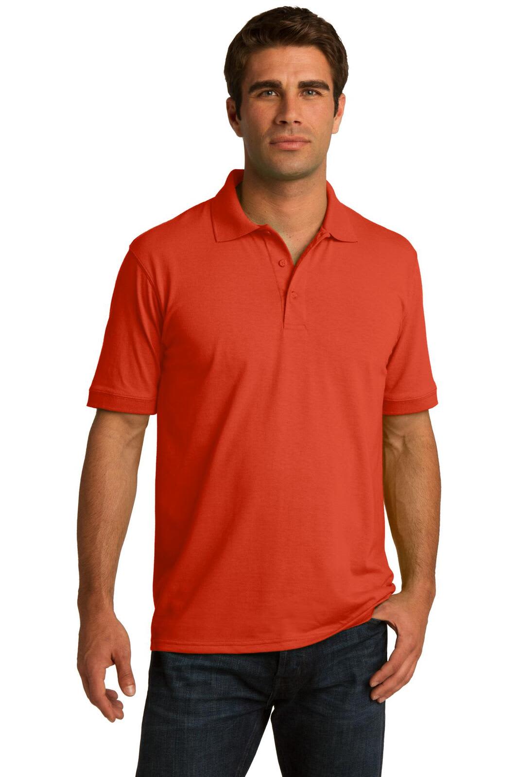 A man stands wearing a bright orange polo shirt. The shirt features a collar and has a logo on it.