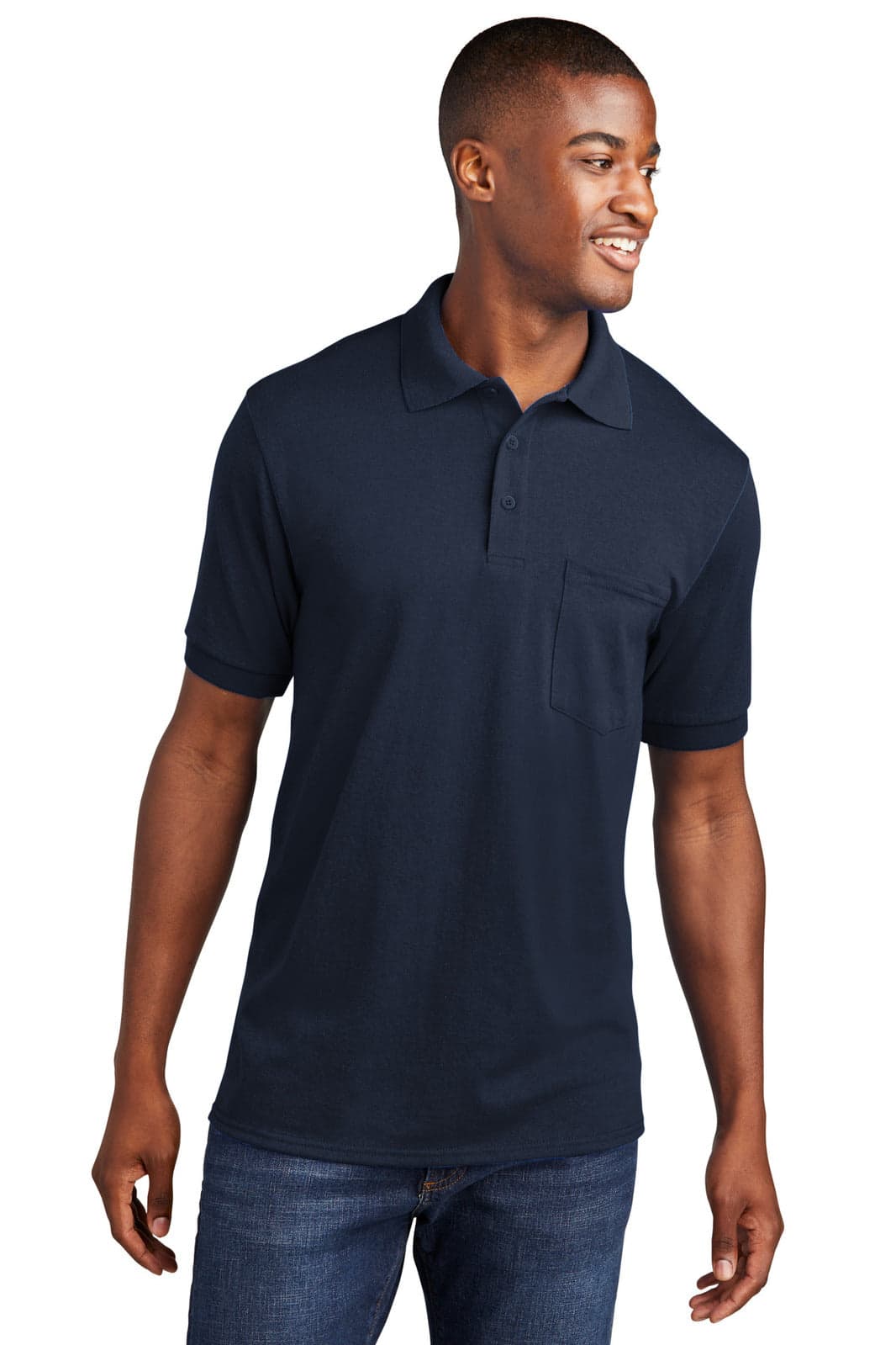 A navy polo shirt with a pocket, featuring short sleeves and a classic collar. The model is standing.