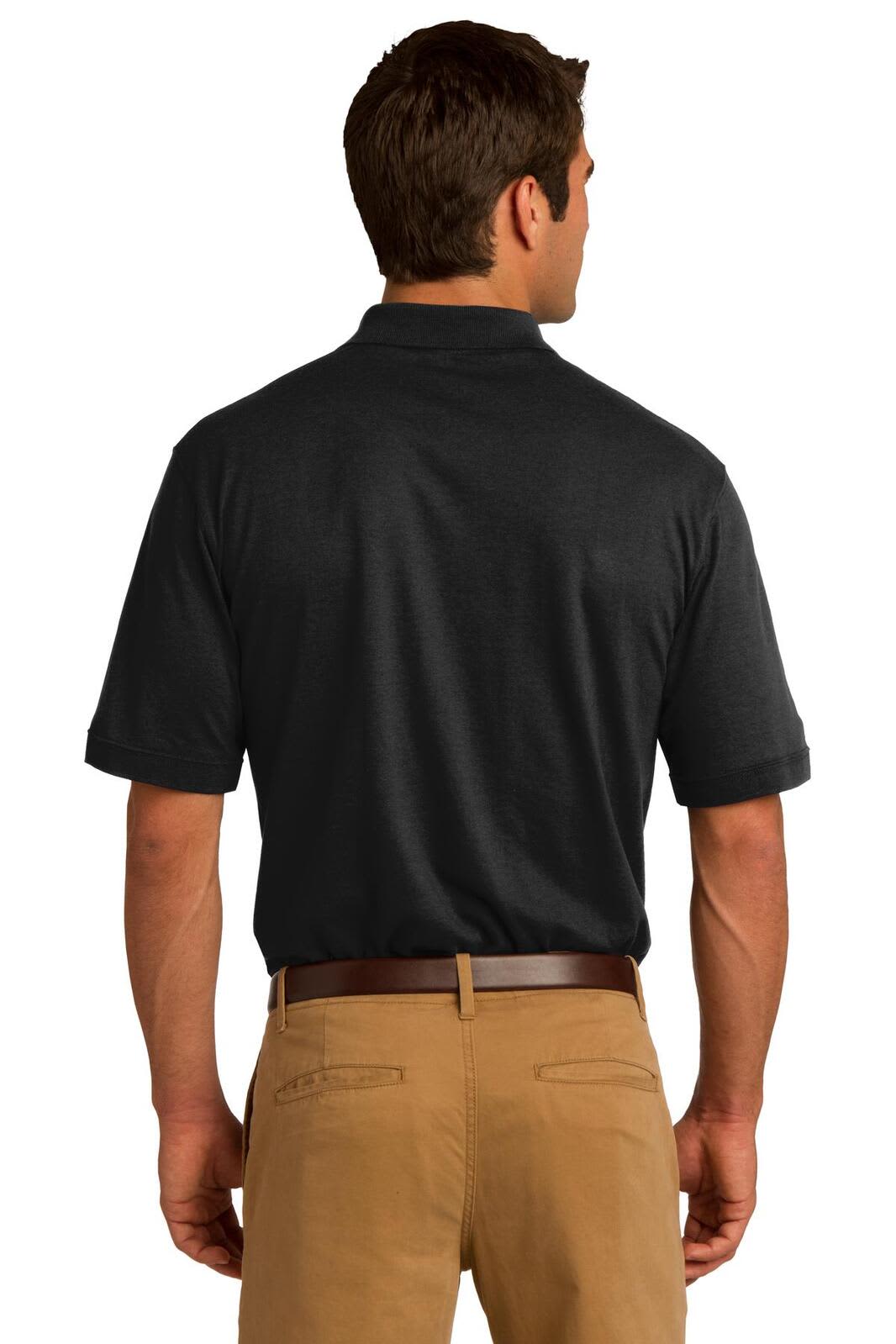 A man in a dark grey polo shirt, viewed from the back, wearing khaki pants. The shirt features a pocket and has a logo.