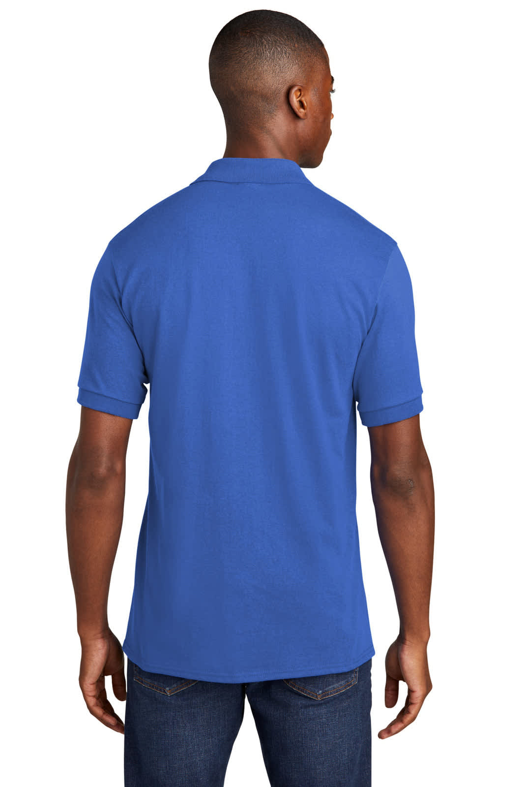 A blue polo shirt with a pocket, featuring a logo, viewed from the back on a model.