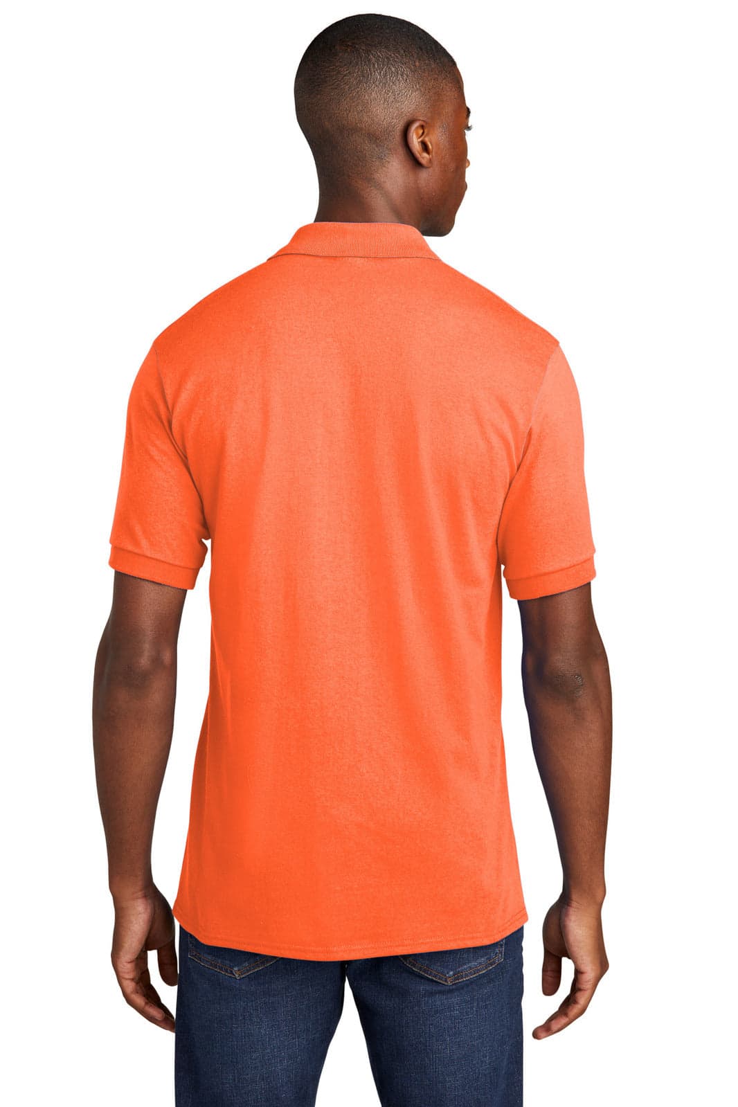 A man wearing an orange polo shirt, viewed from the back. The shirt features a pocket and has a logo.