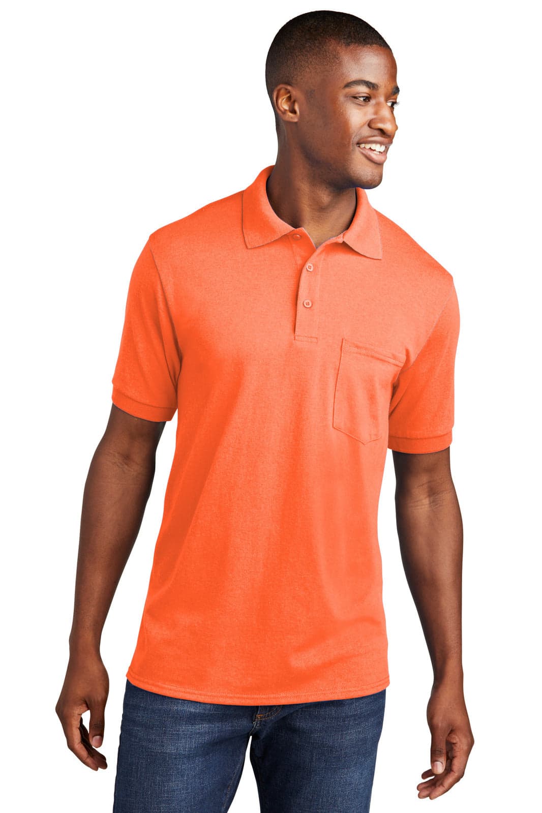 An orange polo shirt with a pocket, featuring a collar and short sleeves. The model is smiling and wearing denim jeans.