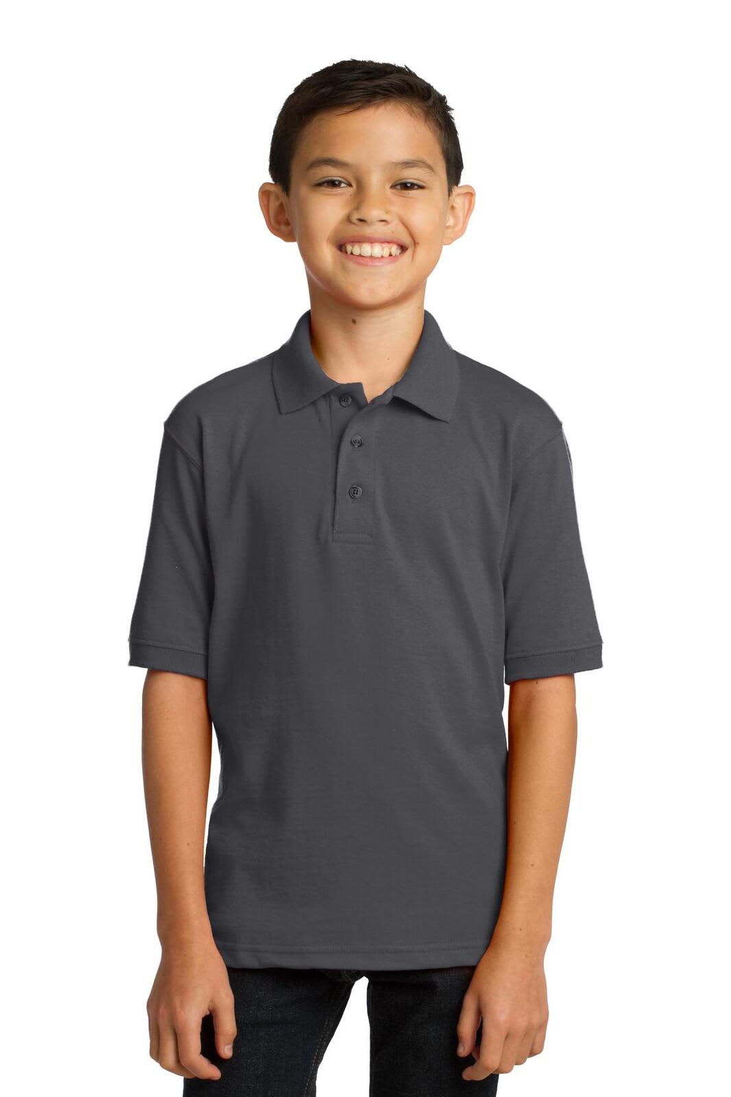 A youth in a charcoal grey polo shirt with a classic collar. The shirt features a logo on the chest.