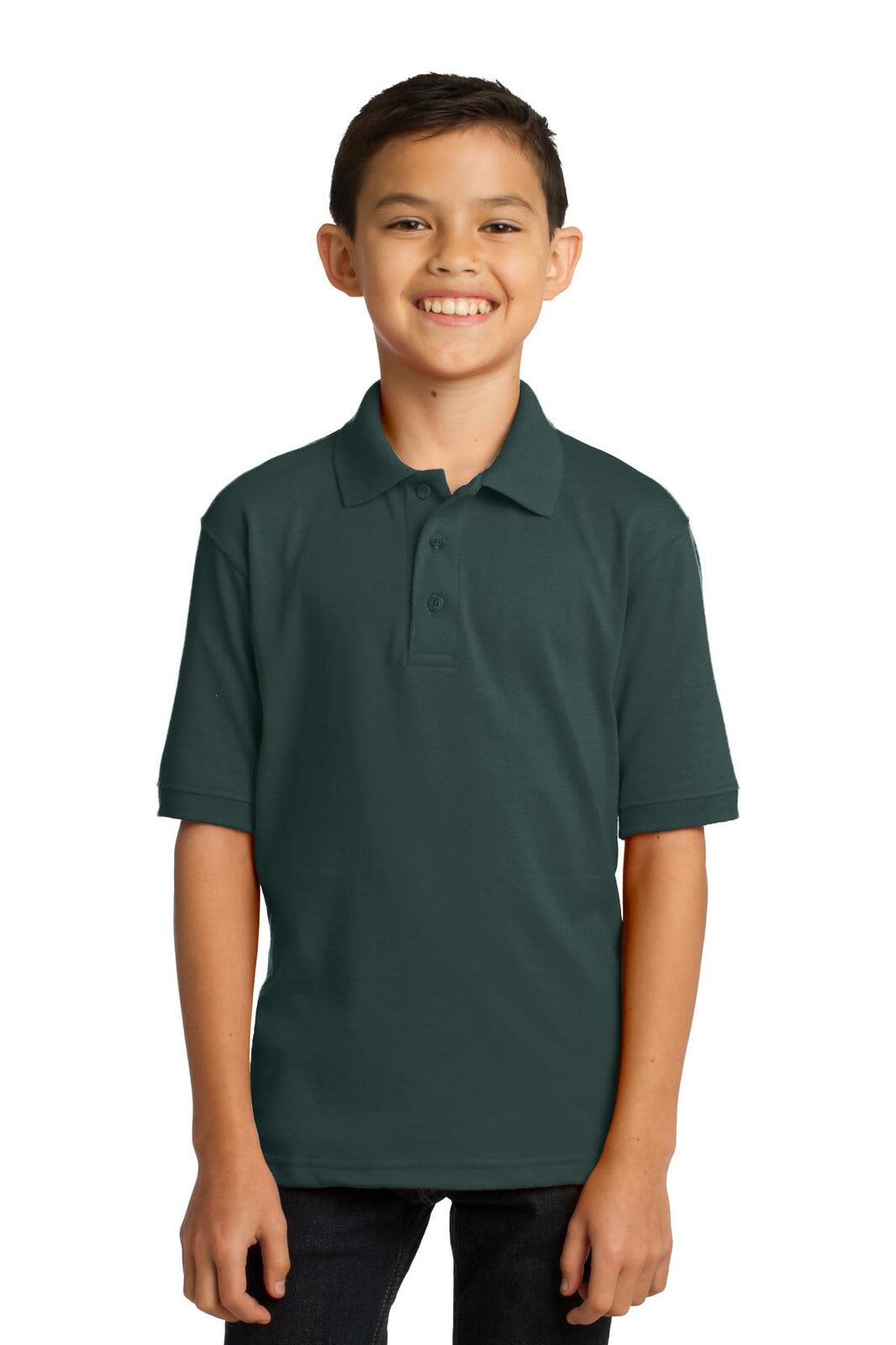 A youth wearing a dark green polo shirt, featuring a collar and short sleeves. The shirt has a logo.