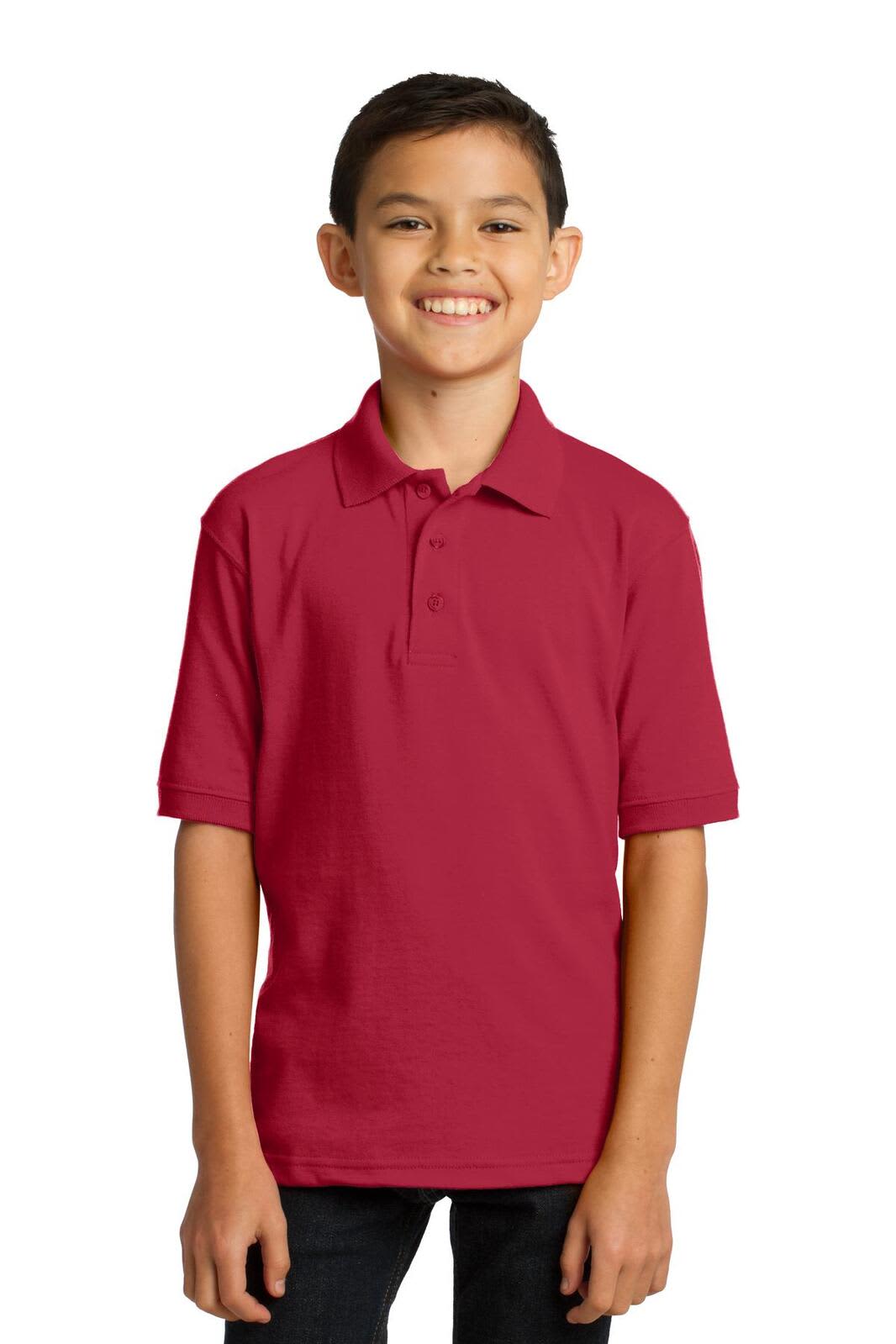 A child wearing a short-sleeve red polo shirt, featuring a collar and a logo on the chest.