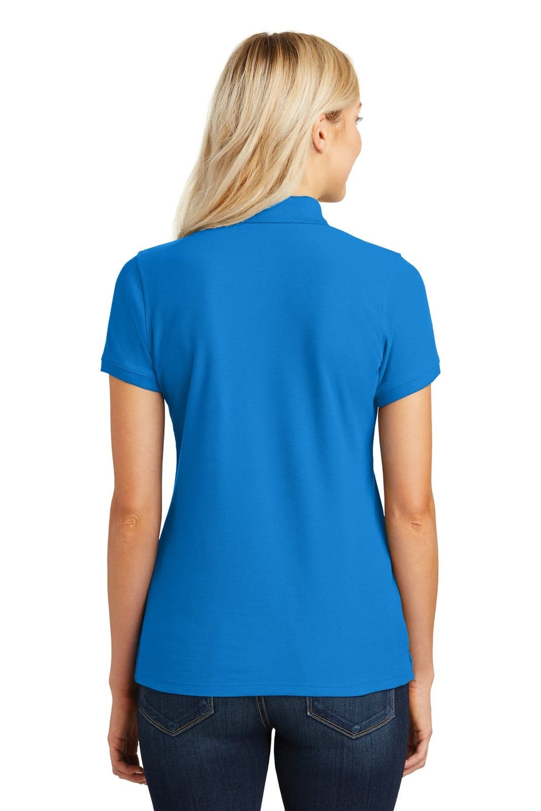 A blue polo shirt with short sleeves, featuring a logo on the back, modelled by a woman from behind.