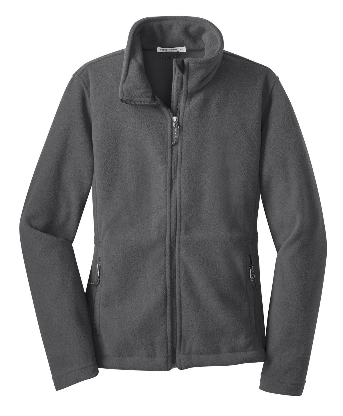 A grey fleece jacket with a high collar and zippered front, featuring side pockets and a logo.