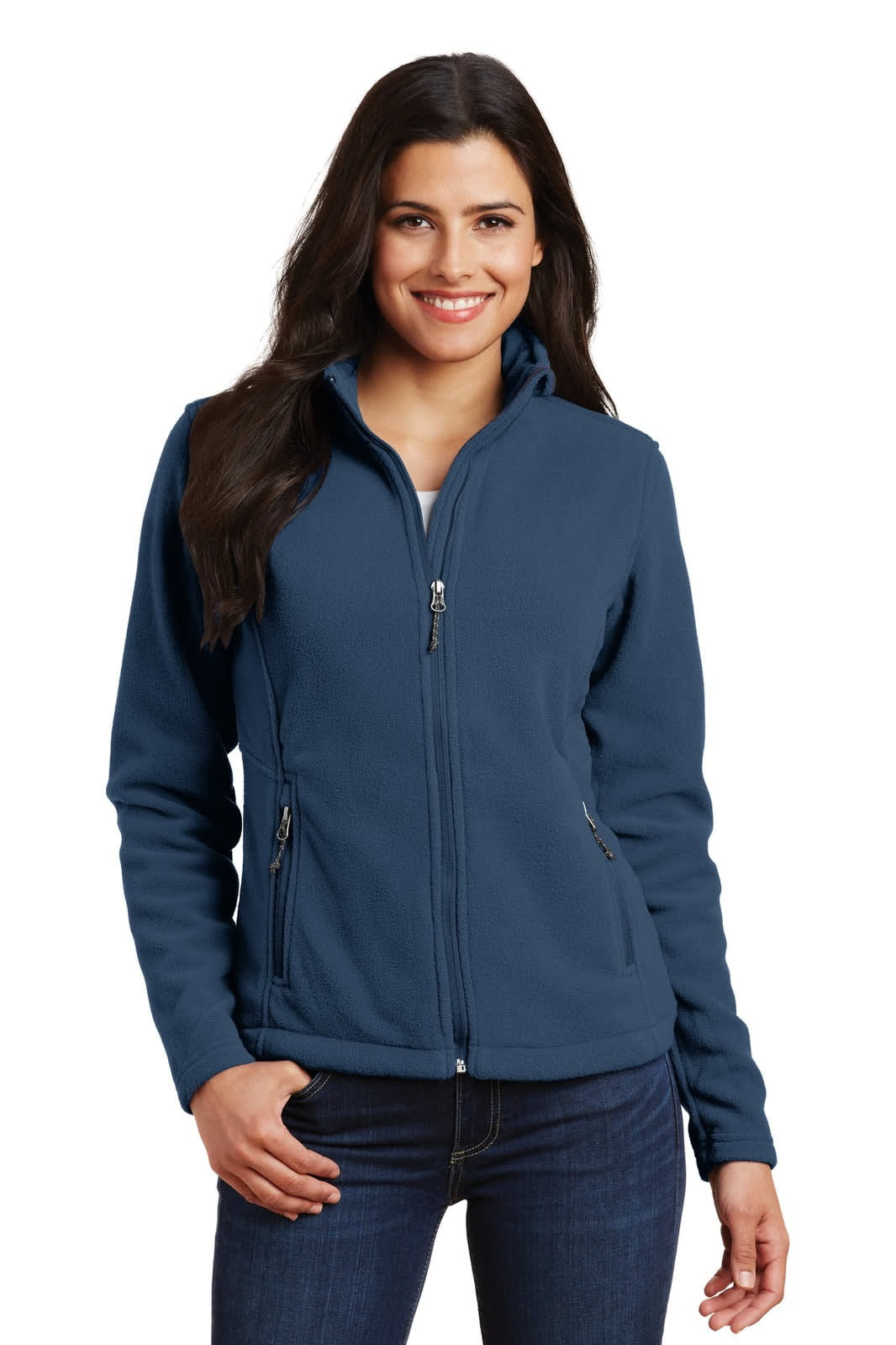 A woman wearing a navy fleece jacket with a zippered front and pockets, featuring a branding logo.