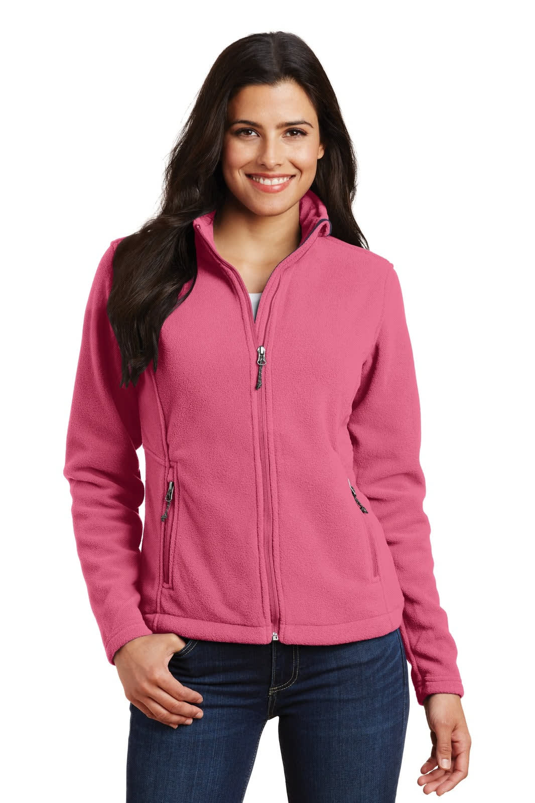 A pink fleece jacket featuring a zip front, high collar, and side pockets, worn by a smiling woman.
