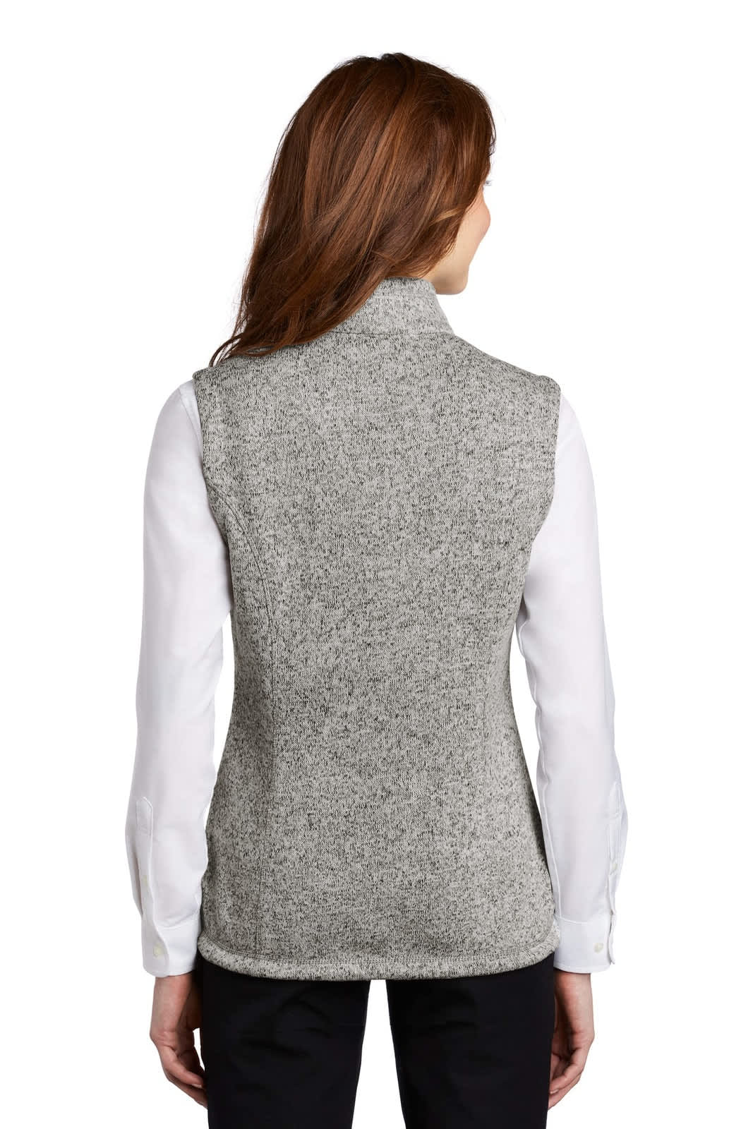A grey fleece vest worn over a white long-sleeve shirt, featuring a standard collar and a logo on the back.