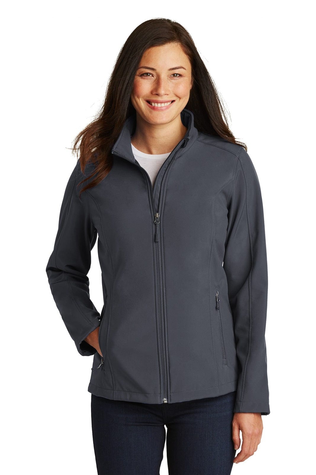 A woman models a grey soft shell jacket with a zip front and two side pockets. The jacket has a logo.