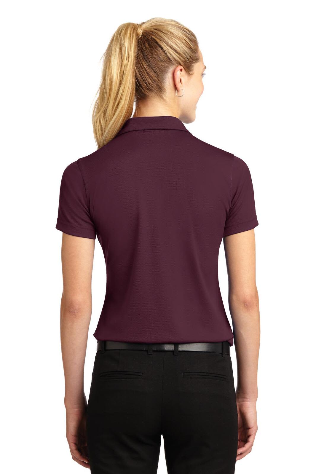 A maroon Sport-Tek Ladies Dri-Mesh V-Neck Polo with a back view, featuring a sleek design and a logo.