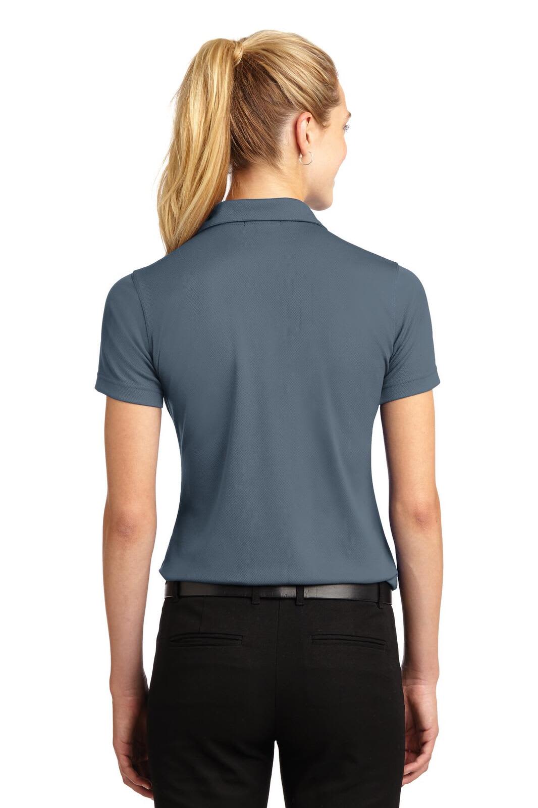 A back view of a women's polo shirt in navy blue, featuring a collar and short sleeves, with a logo on the front.