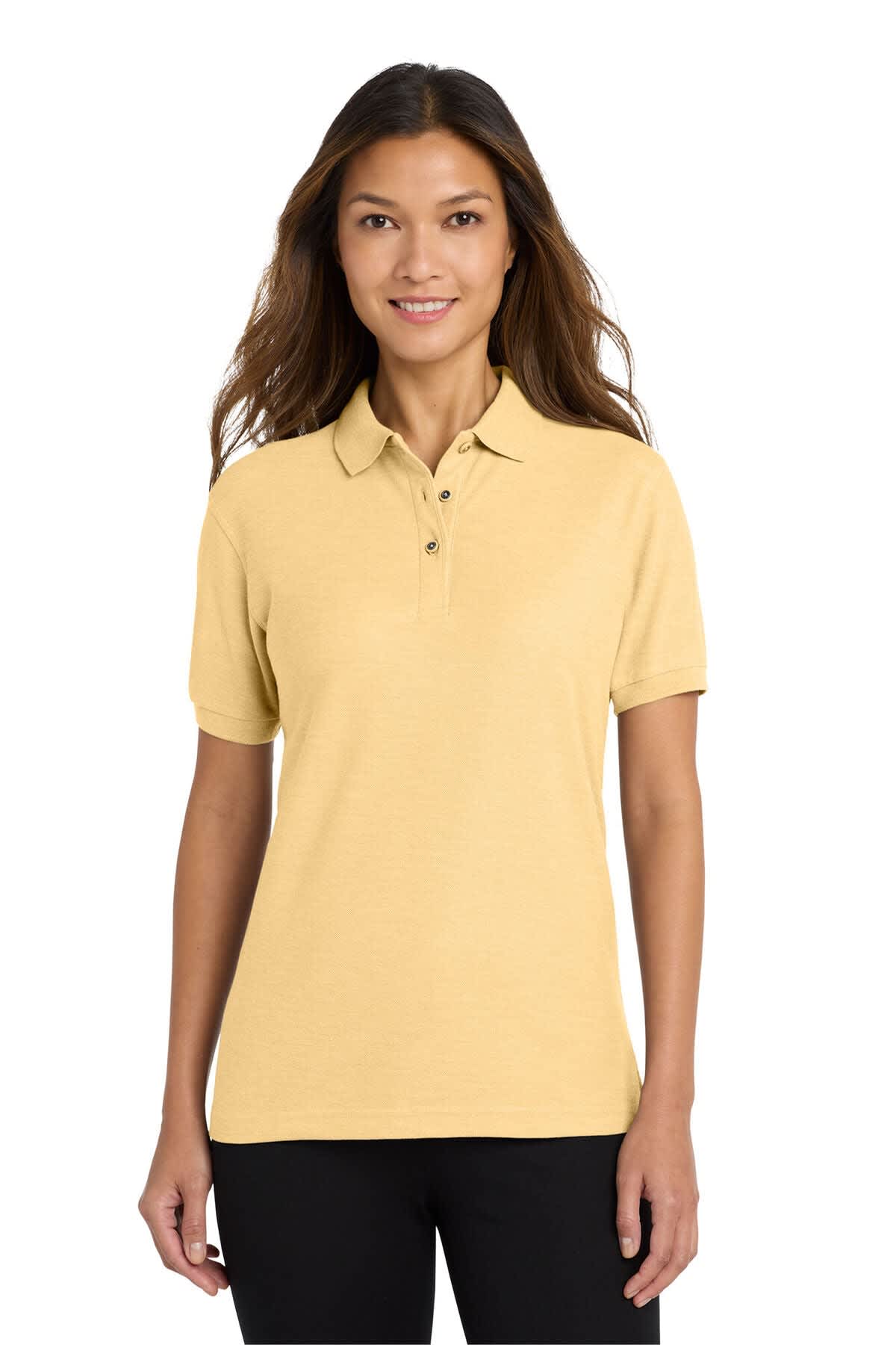 A light yellow polo shirt for ladies, featuring a collar, short sleeves, and a logo on the chest.
