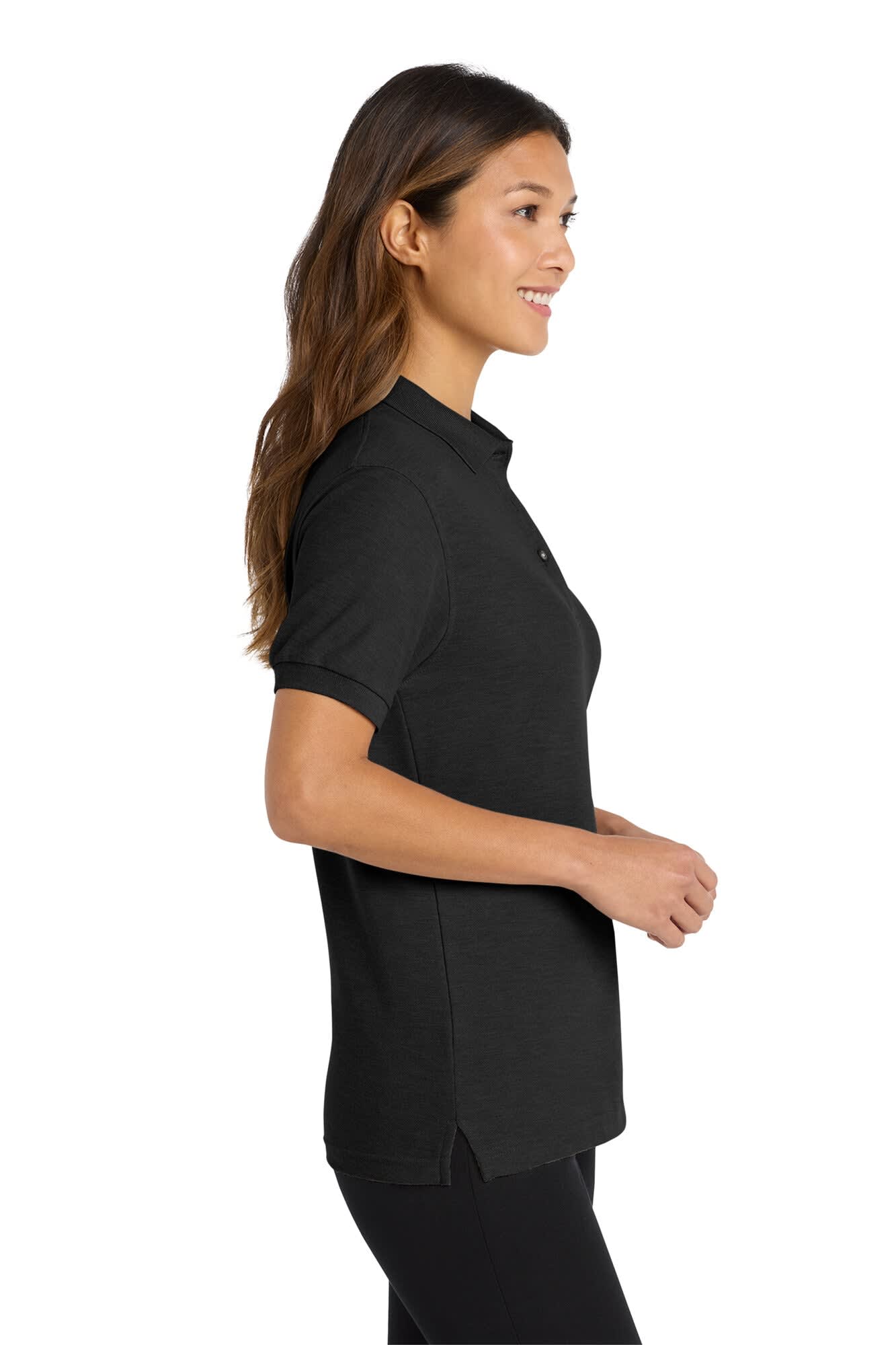 A polo shirt in black, featuring a classic design and a logo, displayed on a model from the side.