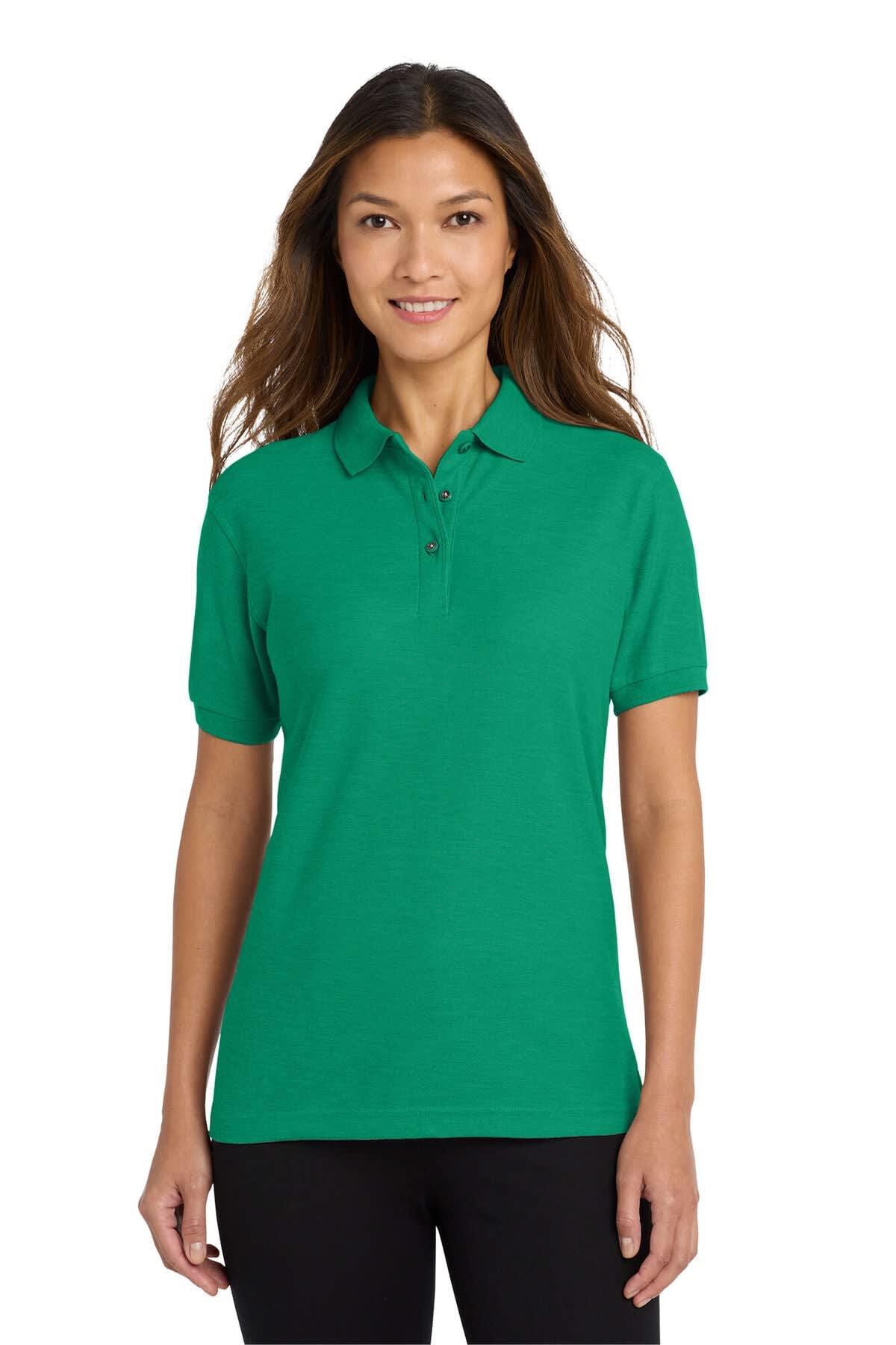 A green ladies' polo shirt with a collar and short sleeves, featuring a logo on the left sleeve.