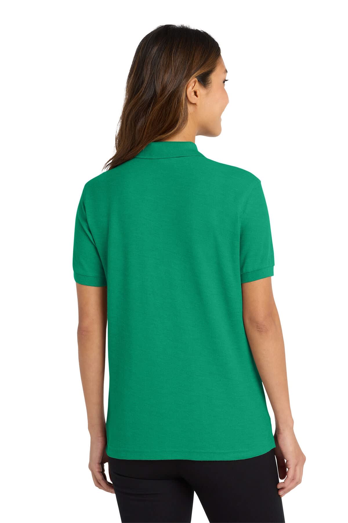 A green ladies' polo shirt with a classic design, featuring a logo on the back.