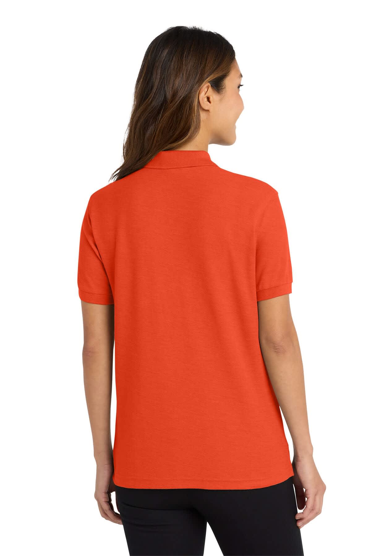 An orange ladies' polo shirt with a back view, featuring a collar and short sleeves. It includes a logo.