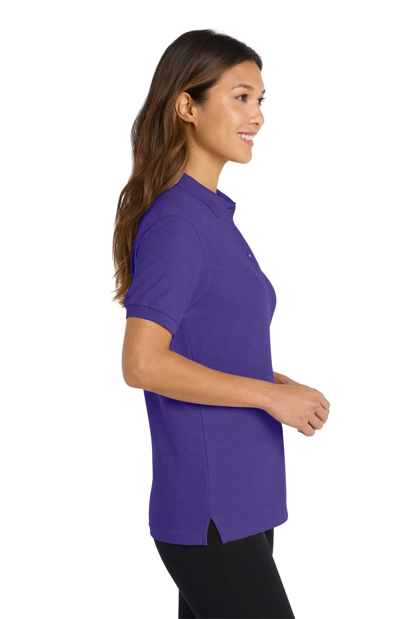 A purple polo shirt with a collar and side slits, featuring a logo on the chest, modelled by a woman.