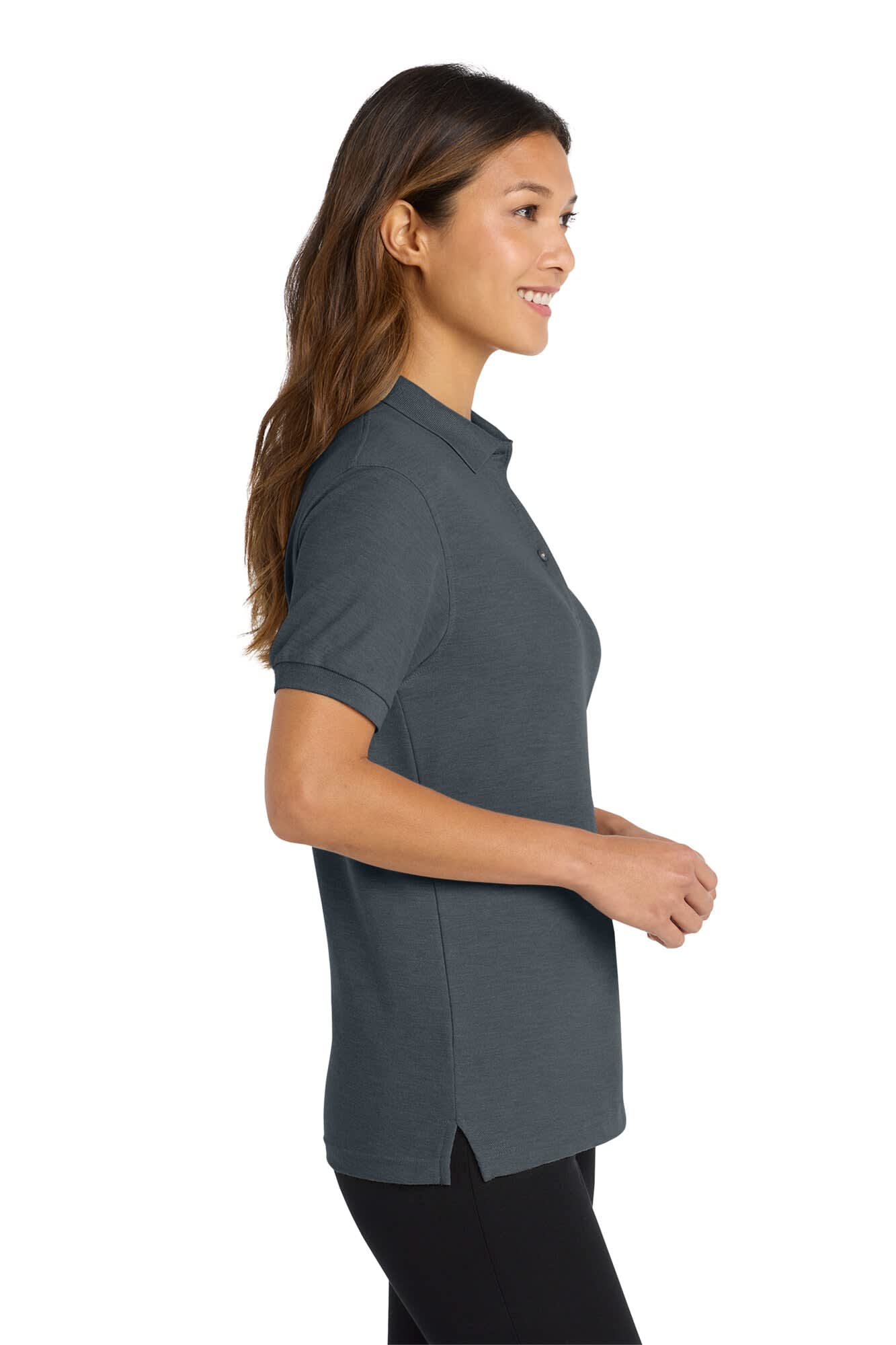 A grey women's polo shirt with a collar, featuring a logo, shown on a model from the side.