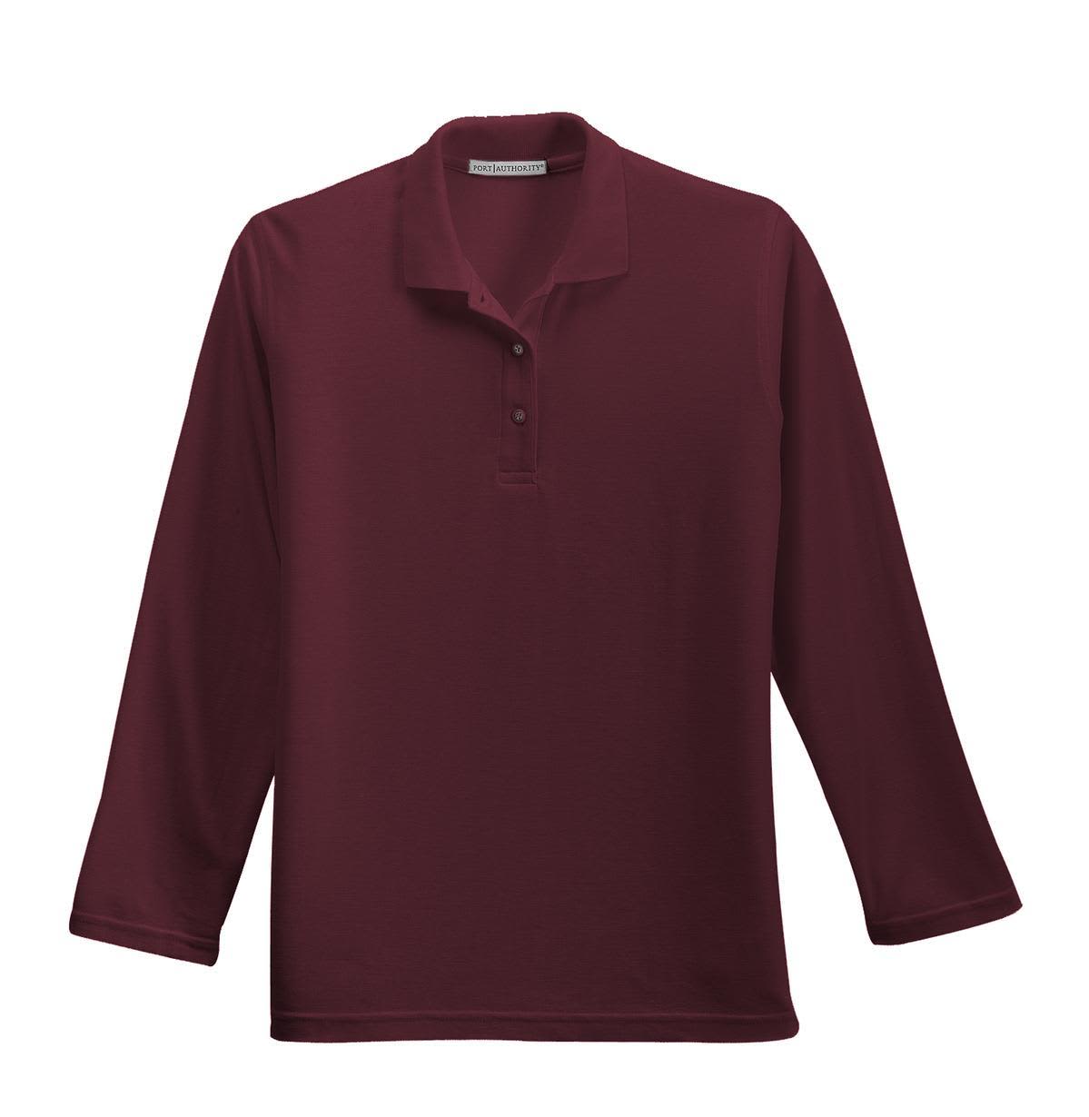 A maroon long sleeve polo shirt featuring a button placket and a single logo on the chest.