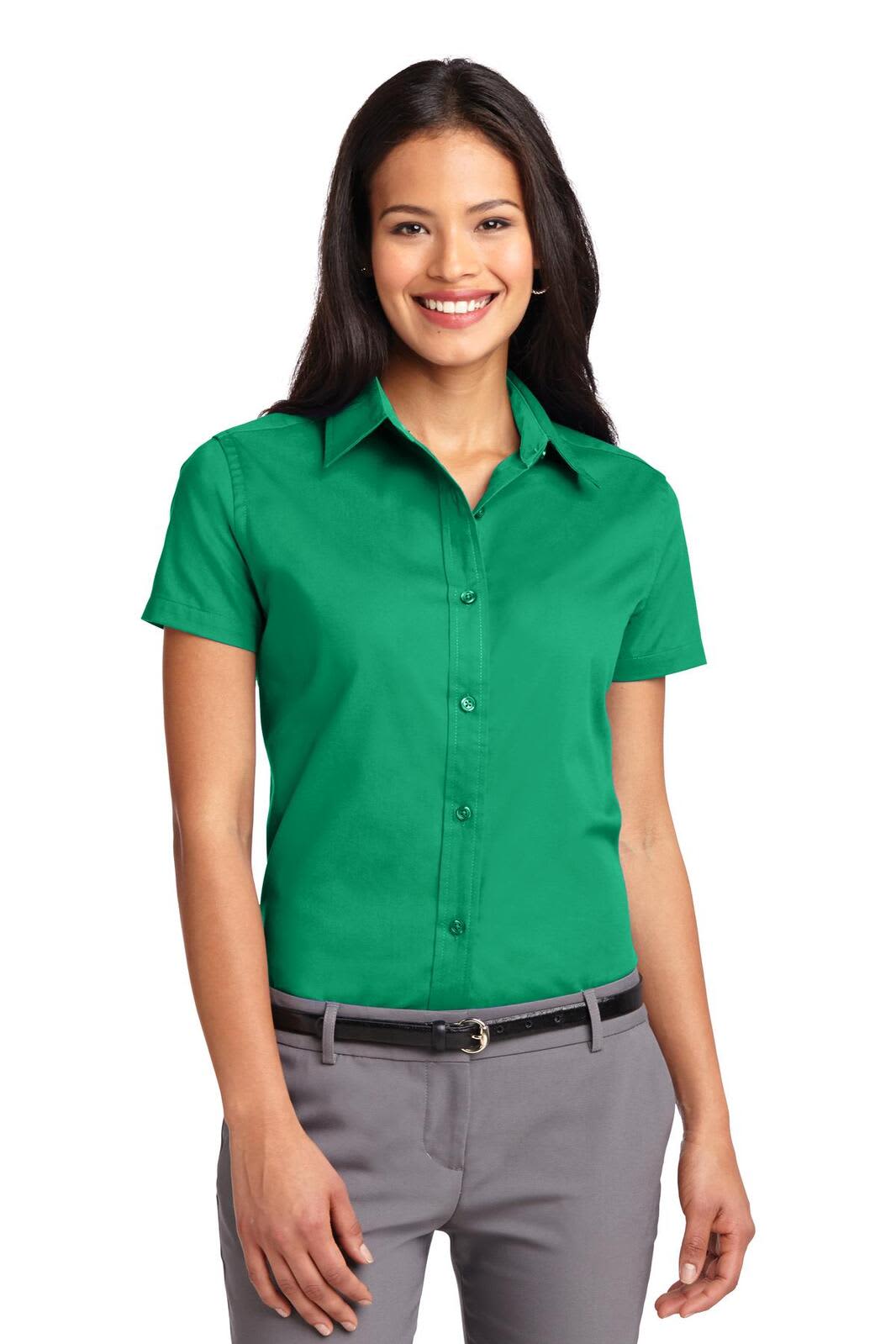 A green short sleeve button-up shirt for women, featuring a collar and a fitted style, with a branding logo.