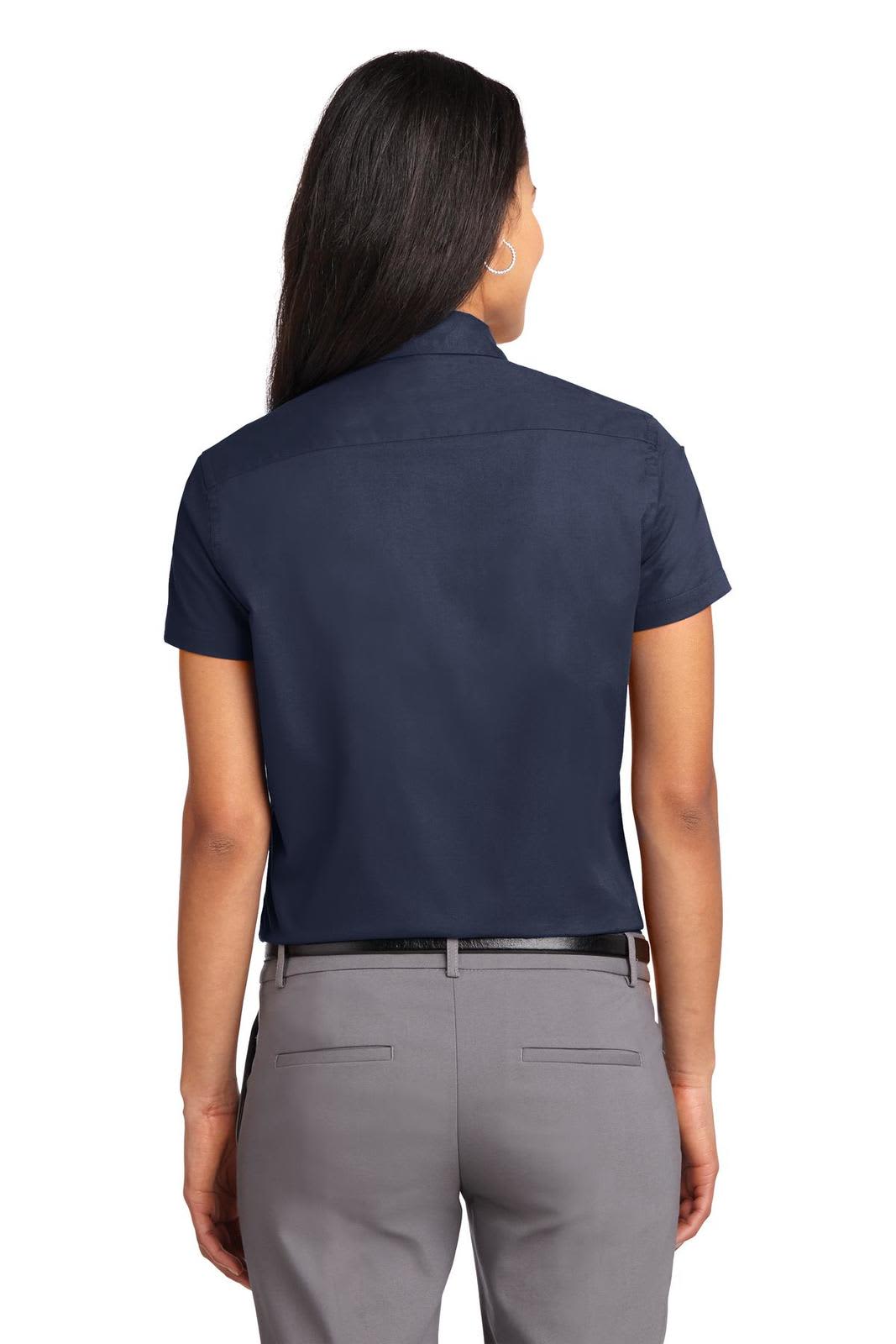 A navy blue short sleeve button-up shirt with a rear view, featuring a collar and fitted design.