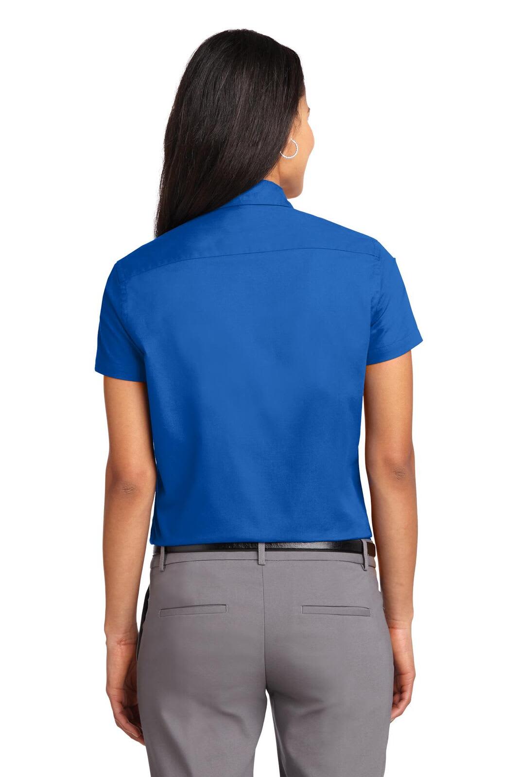 A blue short sleeve button-up shirt, featuring a modern fit and a back view design. Includes a logo on the collar.