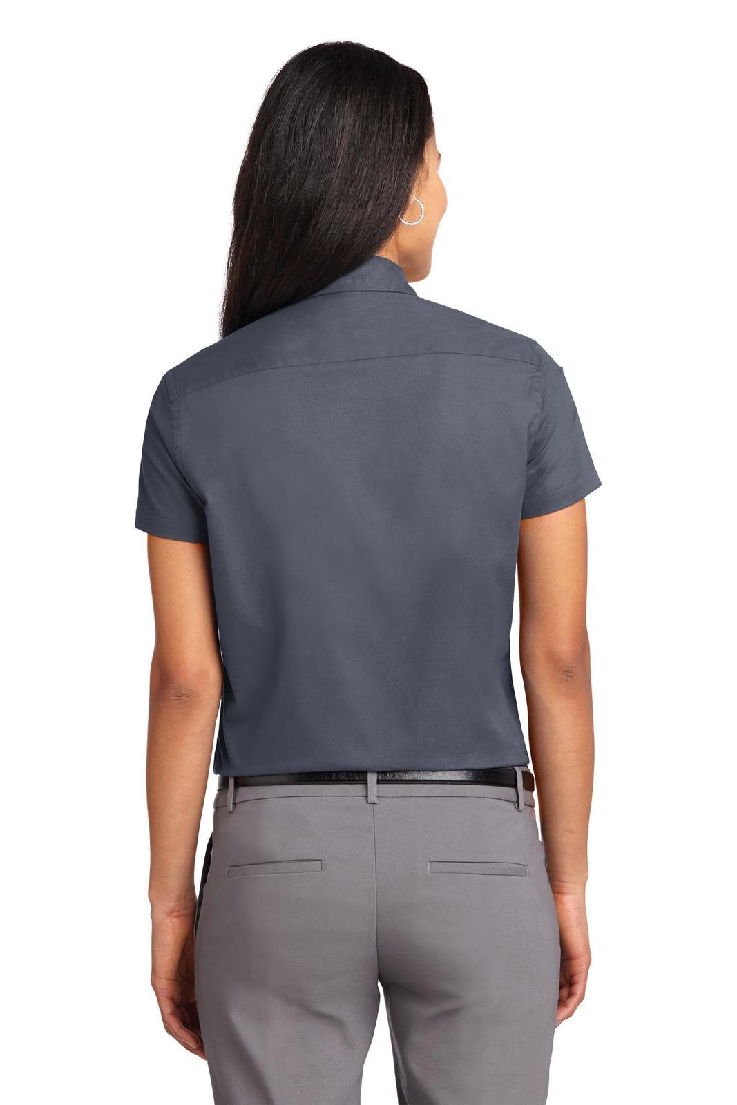 A navy blue short sleeve button-up shirt for women, featuring a simple back design. 