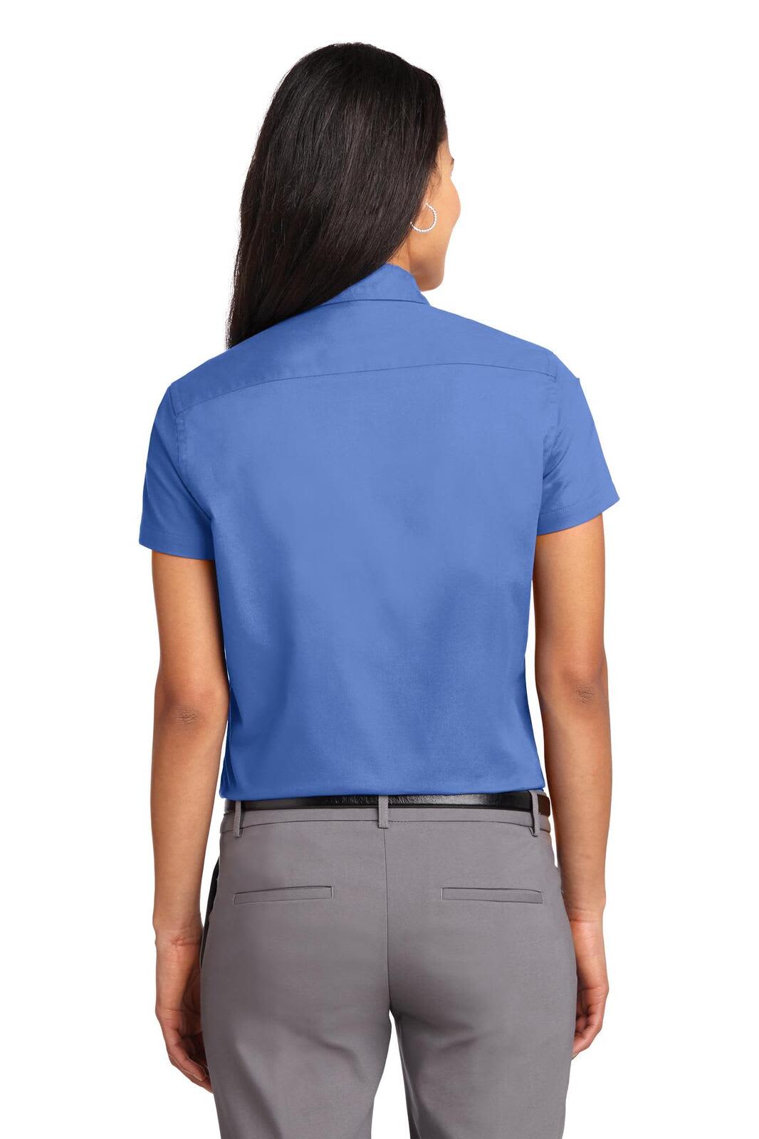 A short sleeve blue button-up shirt with a simple back design, featuring a brand logo.