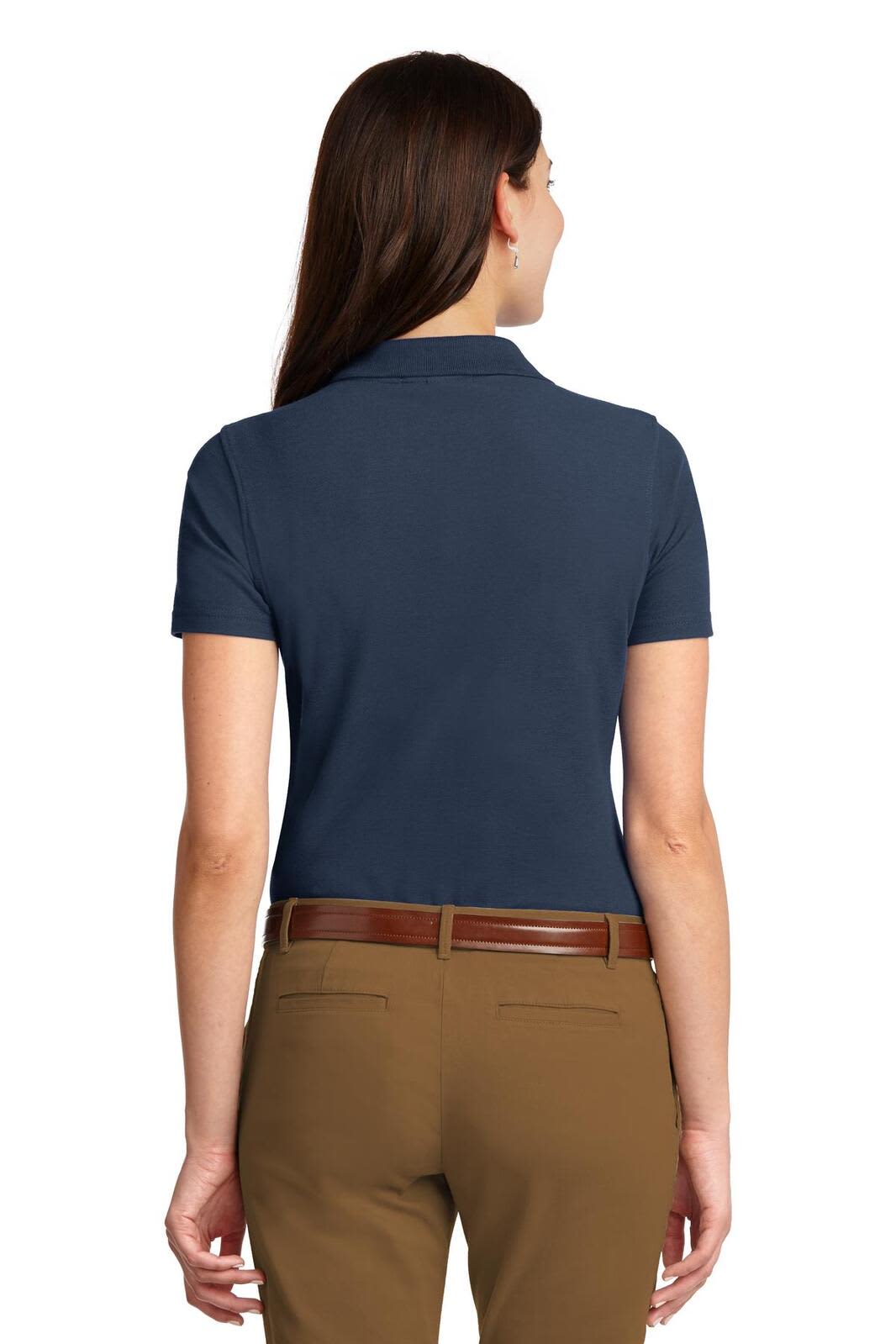 A navy blue ladies' polo shirt with a short sleeve and a back view, featuring a logo.